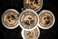 A group of four cylindrical metal tins with a design that includes a honeycomb pattern and the words 'Blue Spur Milk and Honey'.